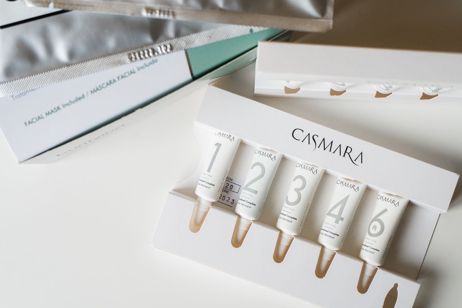 Close-Up Shot of Skin Care Products on White Surface