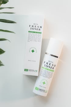 High-quality image of HISTOLAB Beta Fresh Toner with packaging, styled on white surface with leaves.