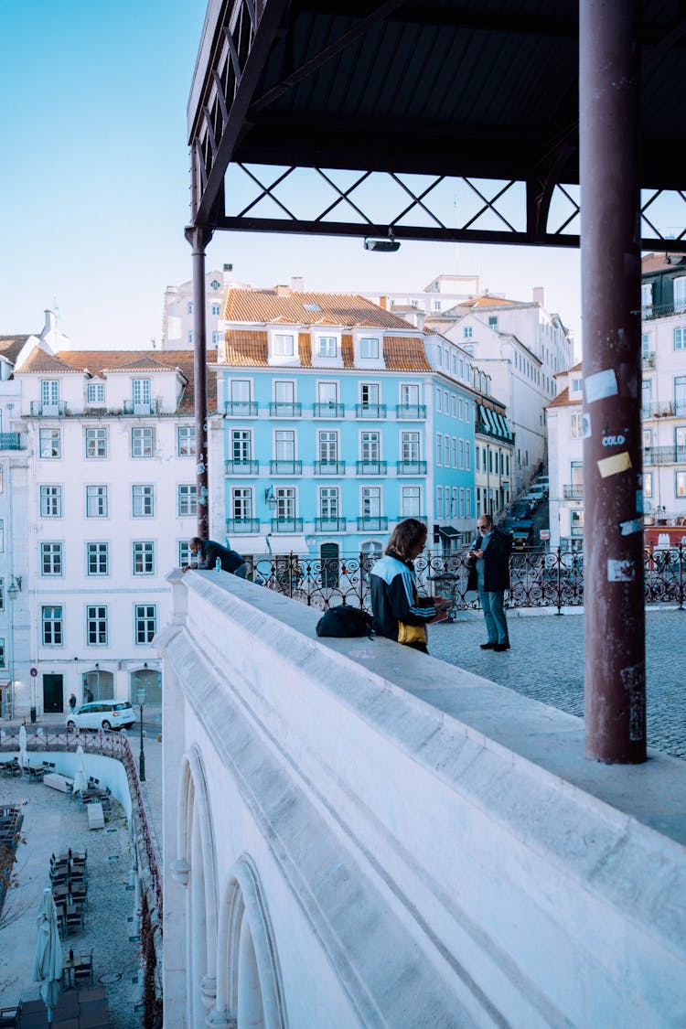 People On Rooftop Of Hotel