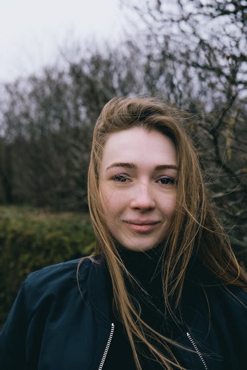 Woman Wearing Blue Jacket