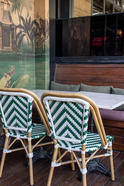 Green and White Wooden Chairs