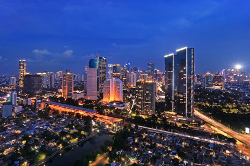 Free Stunning view of Jakarta's illuminated skyline at night, showcasing modern skyscrapers and vibrant urban life. Stock Photo