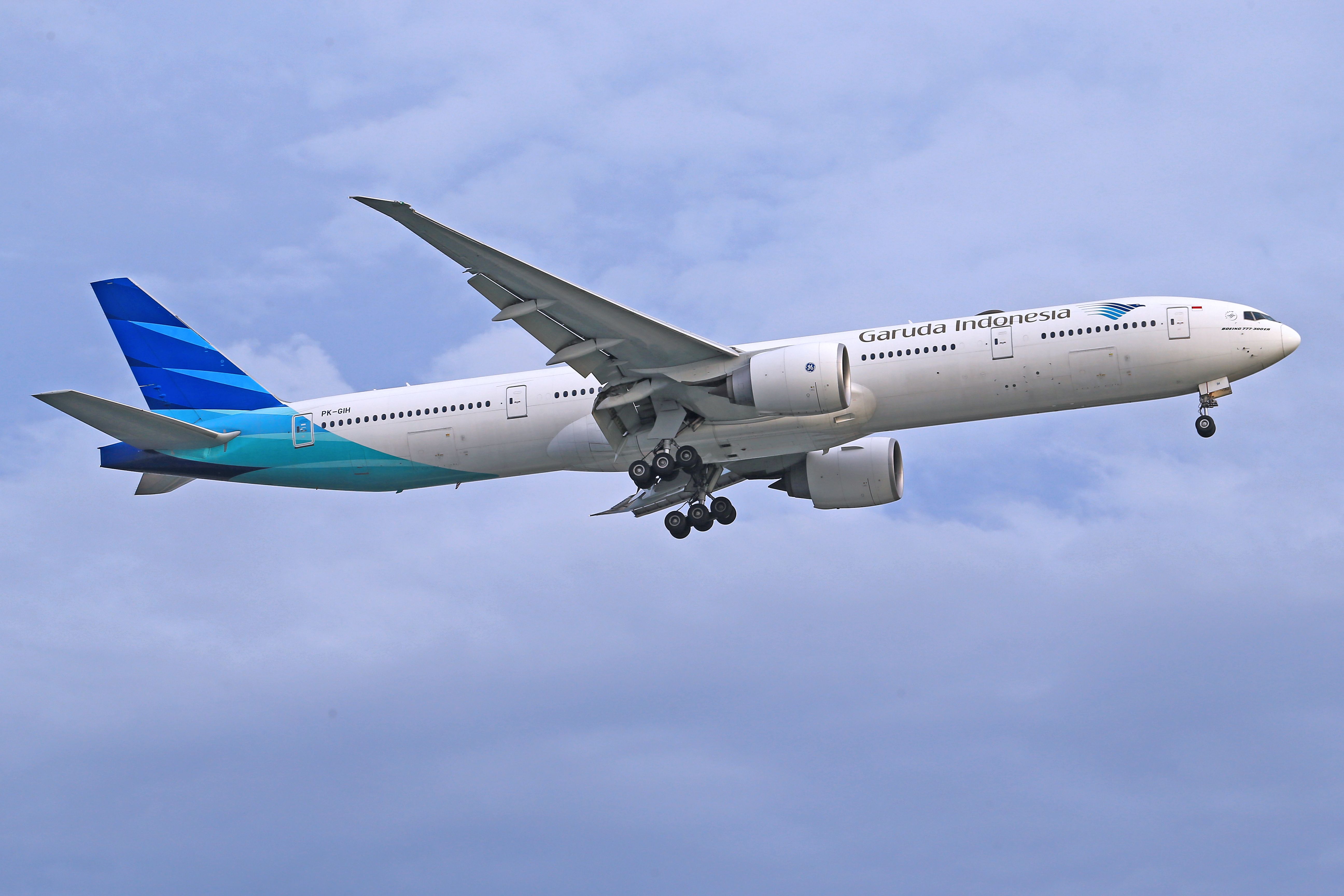 Airplane under Clouds
