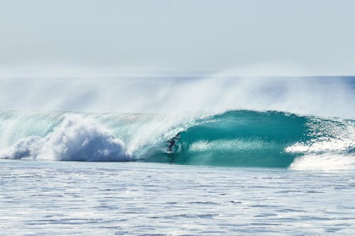 A Person Surfing on the Sea