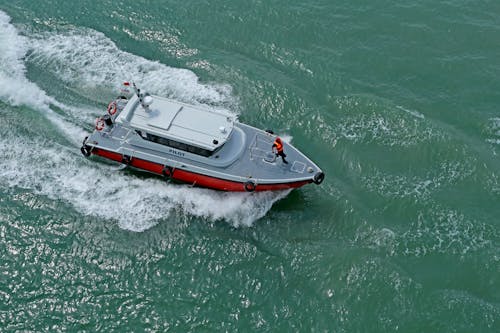 Motorboat on Body of Water