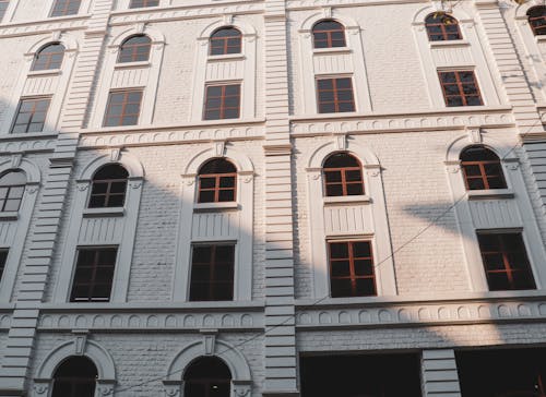 White Brick Building with Arched Windows