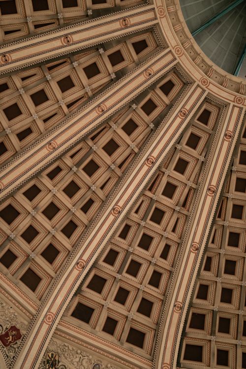 Free Close-up of an ornate dome ceiling design in a Barcelona building, showcasing intricate architectural details. Stock Photo