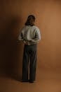 Back View of Woman in Baggy Clothes