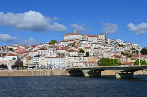 View of City Buildings Under Blue Sky