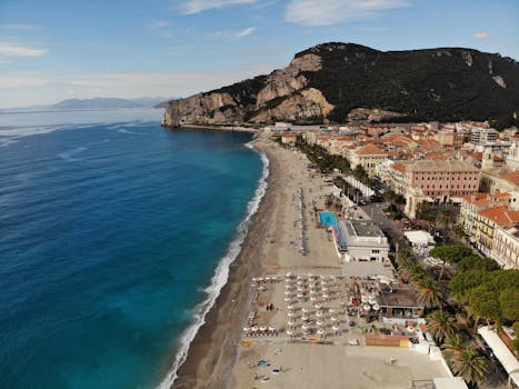 Stunning aerial view of Finale Ligure's coastline and town in Liguria, Italy.
