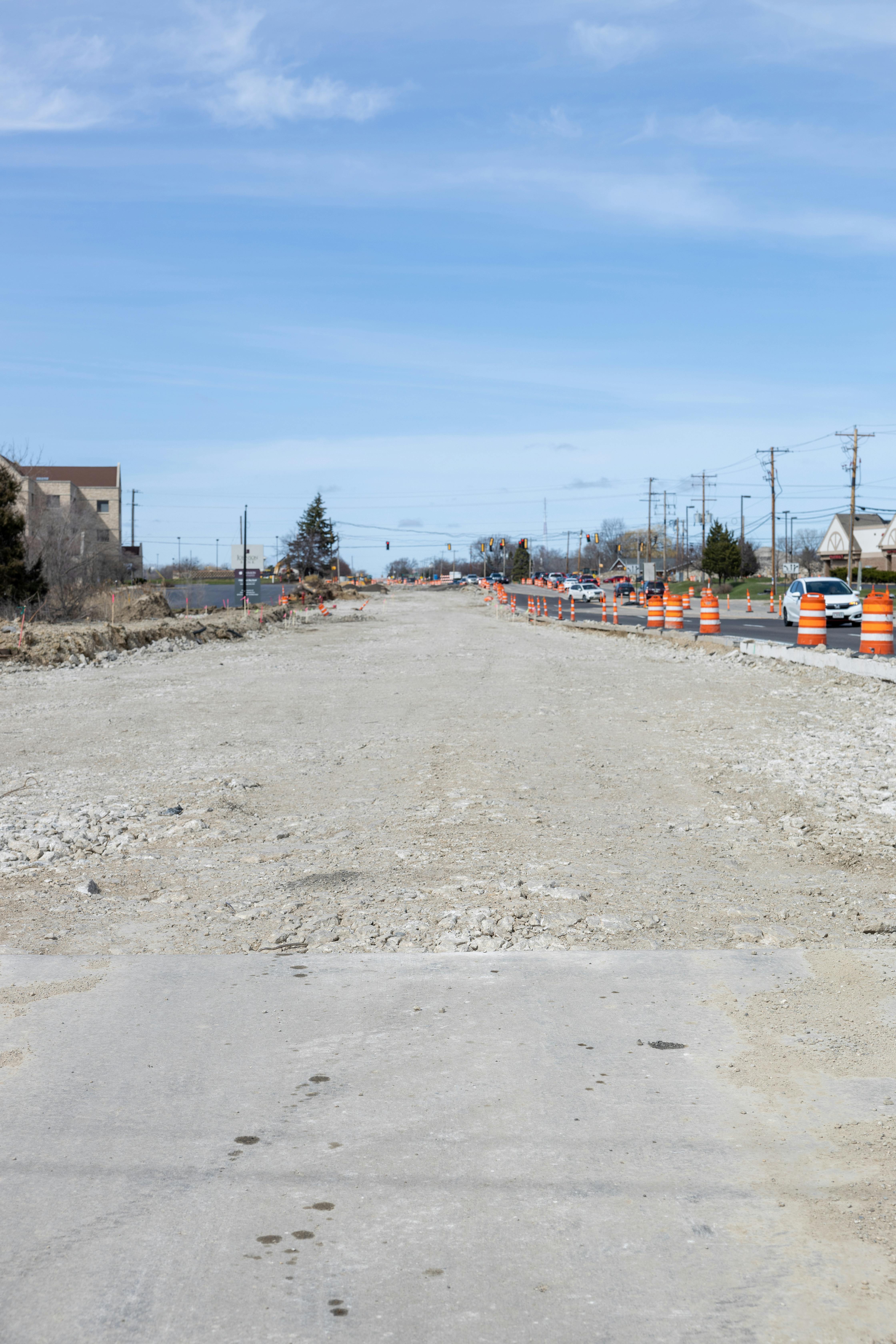 Formula 1 car racing under floodlights at a night grand prix
