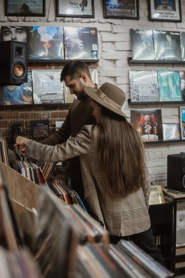 Photo Of A Couple In A Vinyl Records Store