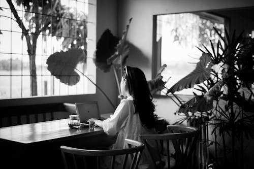 Girl Typing on Laptop