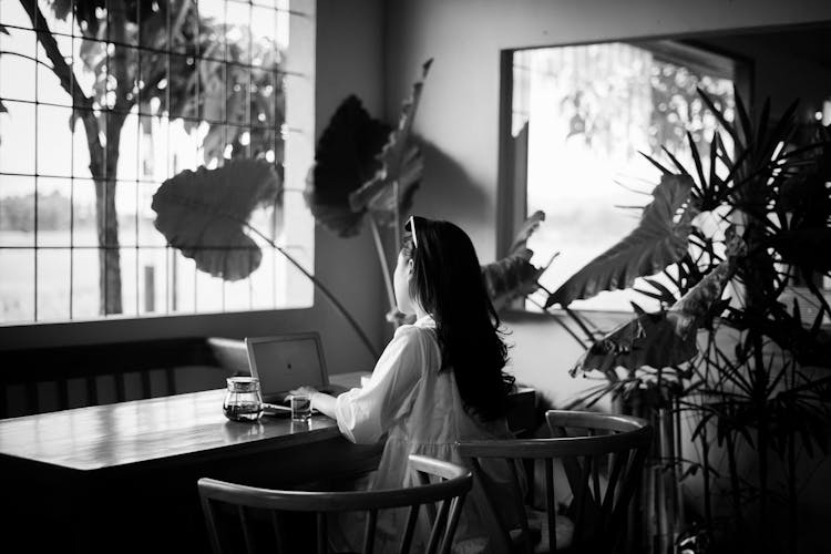 Girl Typing On Laptop