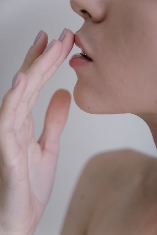 Woman Touching Her Lip