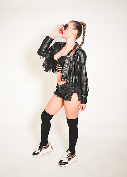 Photo woman with boots, underwear and leather jacket Stock Photo