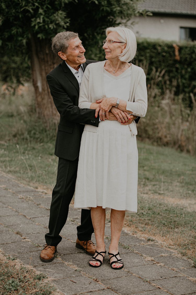 Man Embracing Woman From Behind