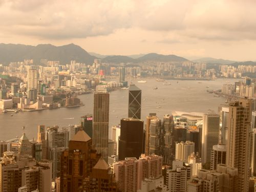 Free Stunning aerial view of Hong Kong's skyline and Victoria Harbour at daytime. Stock Photo
