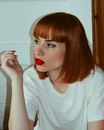 Woman in White Crew Neck Shirt