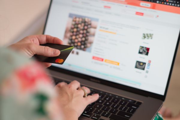 Close up of person using digital payment on smartphone