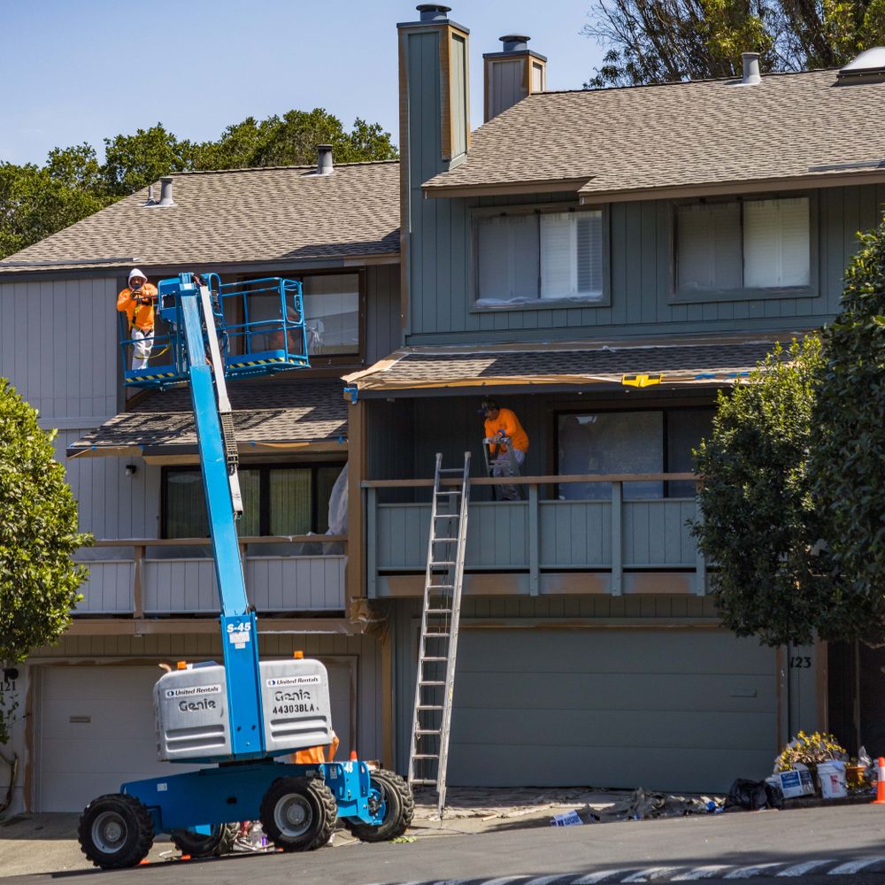 Painters and Decorators in Stonebridge — quality trade paint going on in two coats