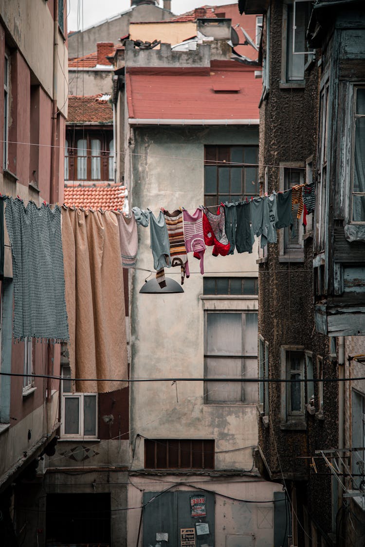 Laundry Drying On Line Between Houses