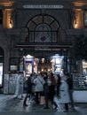 People at the Entrance of Cicek Pasaji in Istanbul, Turkey