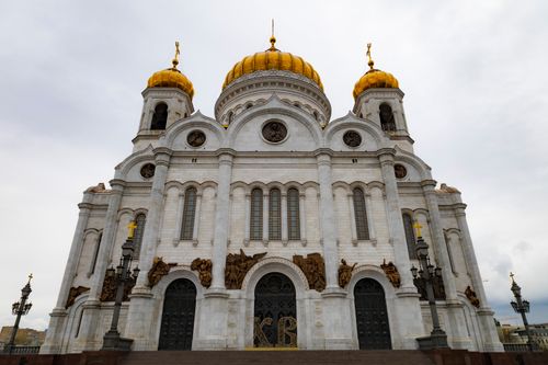 Free Stunning facade of Cathedral of Christ the Savior in Moscow with golden domes on a cloudy day. Stock Photo