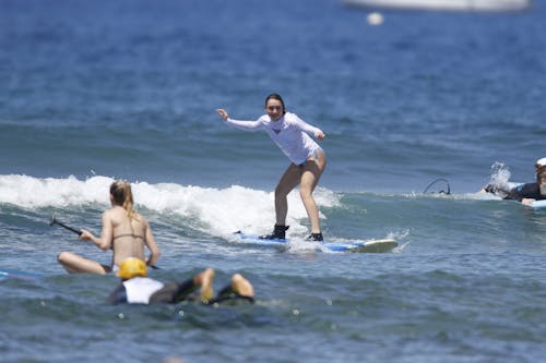 Woman riding a Surfboard 