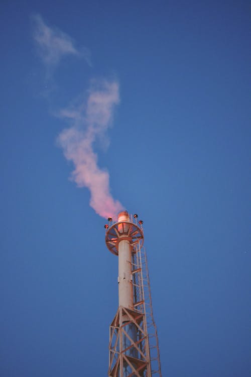 Free White Factory Chimney Under the Blue Sky Stock Photo