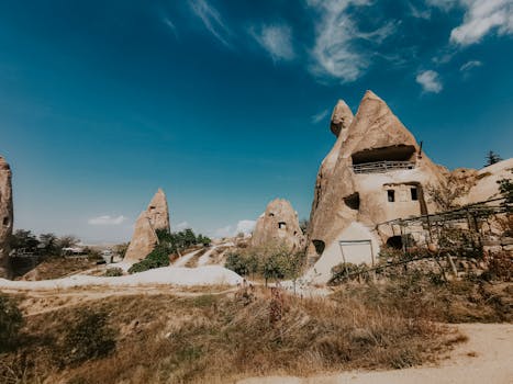 Explore the unique rock formations known as fairy chimneys in Cappadocia, Turkey.