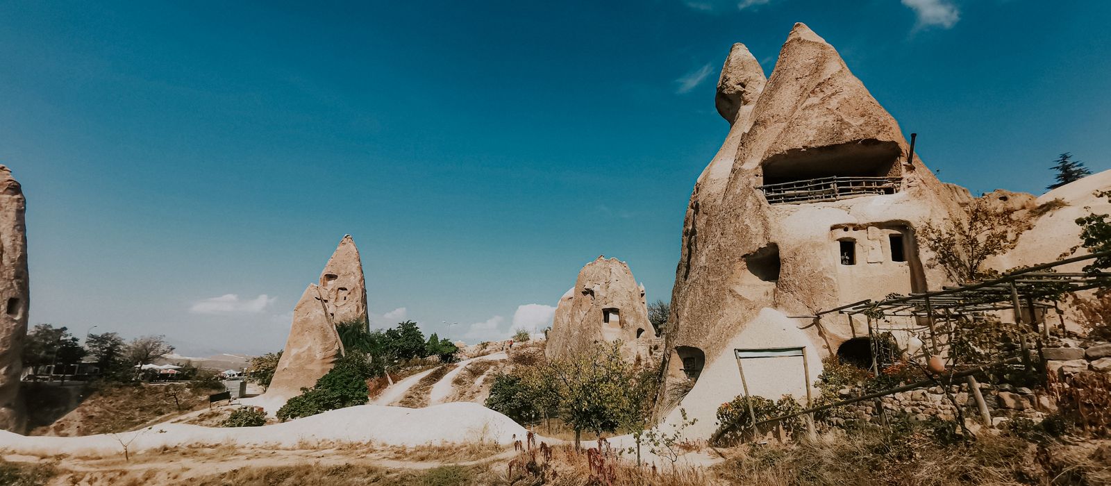 Explore the unique rock formations known as fairy chimneys in Cappadocia, Turkey.