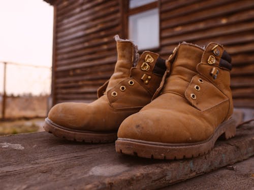 Close-Up Photo of Brown Boots