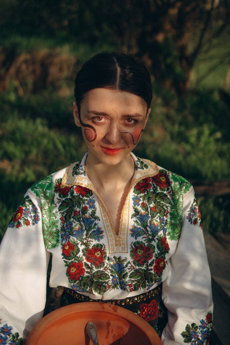 Woman Wearing Folk Costume With Embroidered Shirt