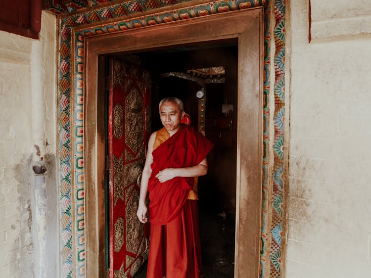 Monk Standing In Entrance