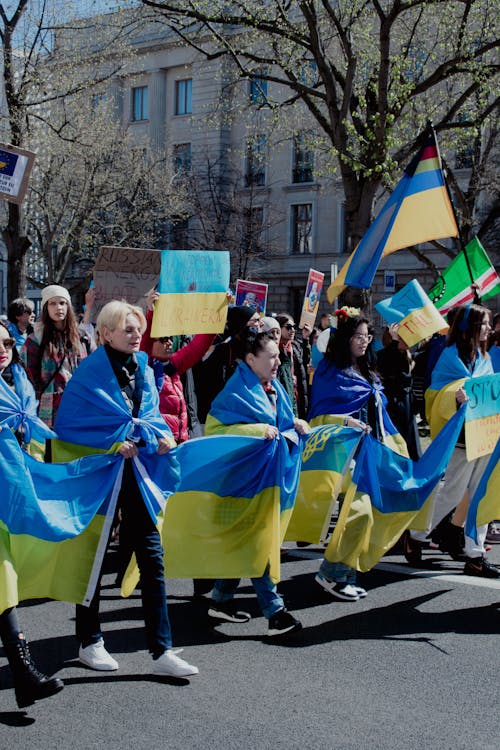 Free People doing a Rally while holding Ukraine Flag  Stock Photo