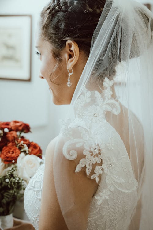 Free A Woman in White Floral Wedding Stock Photo