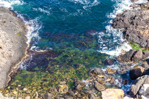 Sea wave crushing on rocks