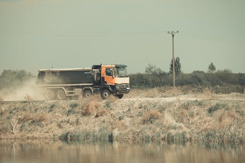 Kostenloses Stock Foto zu außerorts, fahren, feldweg