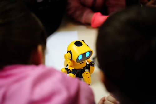 Free A Yellow Toy Robot Stock Photo