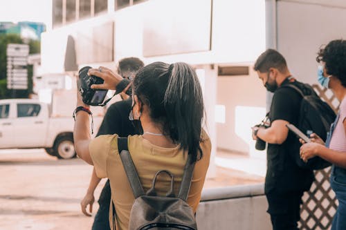 A Woman Holding a Camera