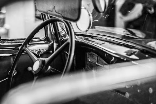 Free Grayscale Photo of Car Steering Wheel Stock Photo