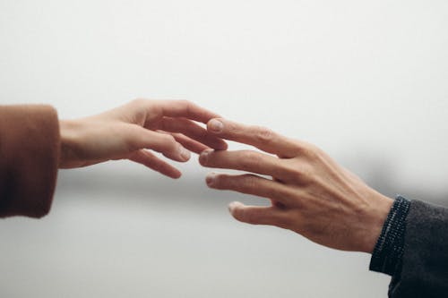 Free Hands Touching with Fingers Stock Photo