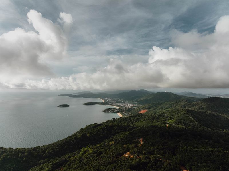 Aerial panorama of bays and forested headlands from Karon Viewpoint, Phuket