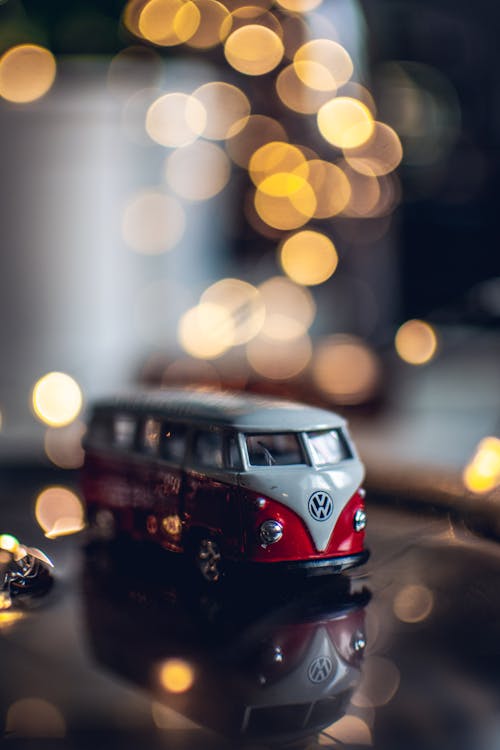 Photo of Red and White Toy Car