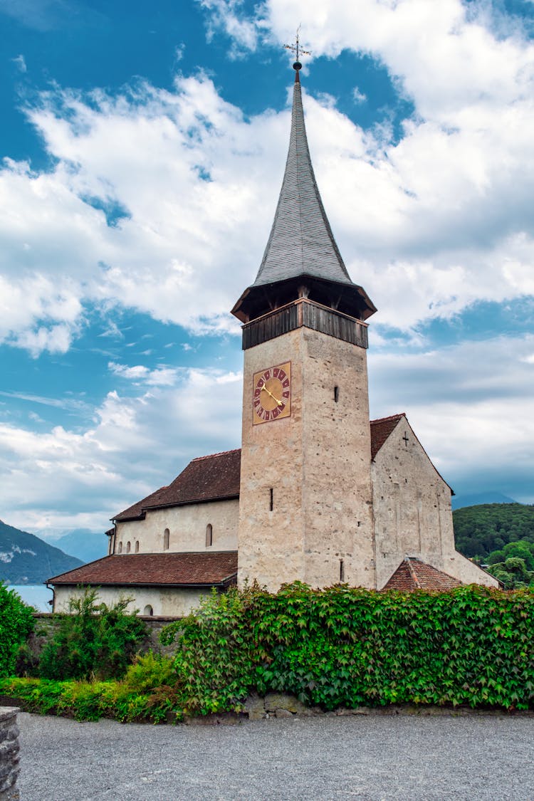 The Clock Tower Of The Spits Castle Church In Spiez Switzerland