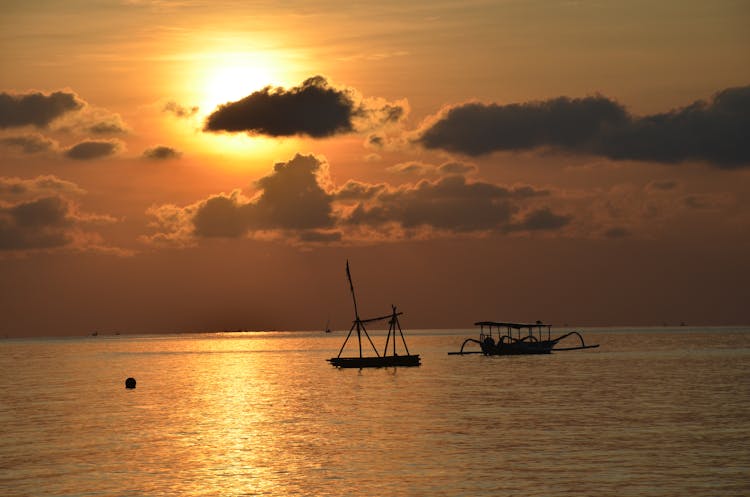 Two Boats Under The Sun Rise In Amed, Bali