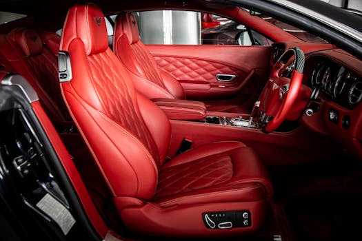 High-quality interior of a luxury car with red leather seats and advanced features.