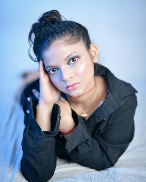 A Woman in Black Long Sleeve Shirt