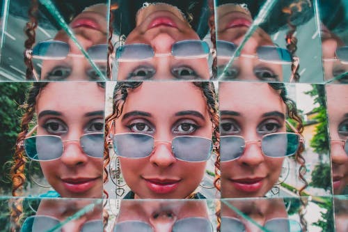 Woman Wearing Gold Framed Sunglasses